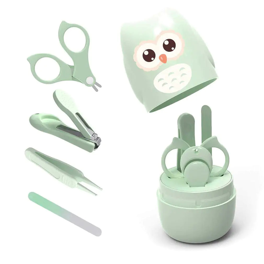 A set of Gigi & Jade Kids Co. Baby Nail Care Set grooming tools, including scissors, nail clippers, tweezers, and a nail file, displayed with a cute owl-shaped holder. The owl-shaped cap is lifted to reveal the tools neatly arranged inside the round base, perfect for tender nail care on your baby's sensitive skin.