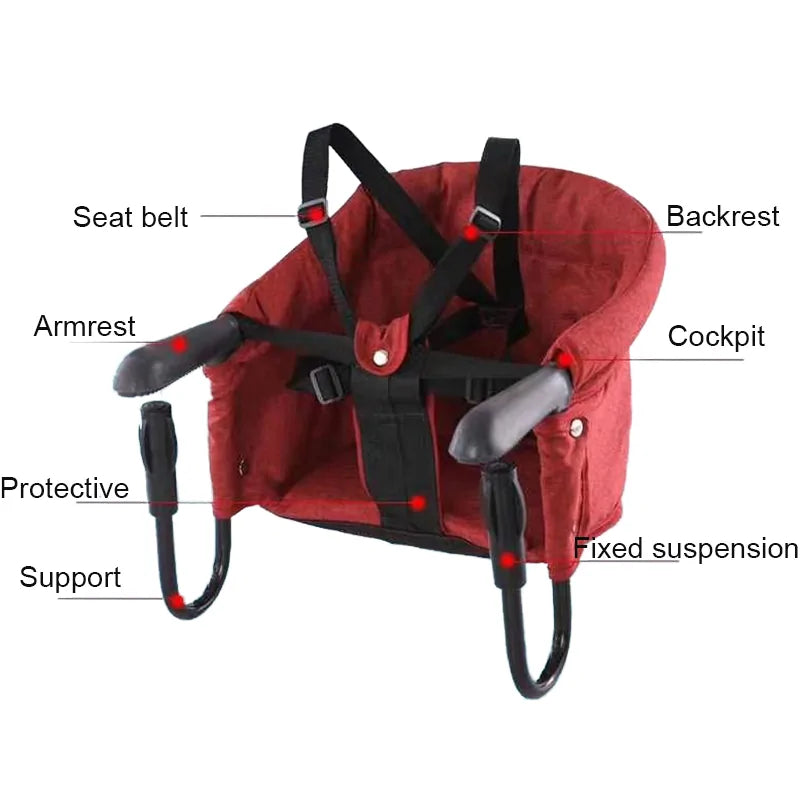 The Gigi & Jade Kids Co. Portable Baby Dining Chair features a sturdy construction with a red design, black seat belt, and backrest. The armrests, cockpit, protective support, and fixed suspension are labeled. With its sturdy metal frame and cushioned fabric, this chair ensures safe seating for your little one.